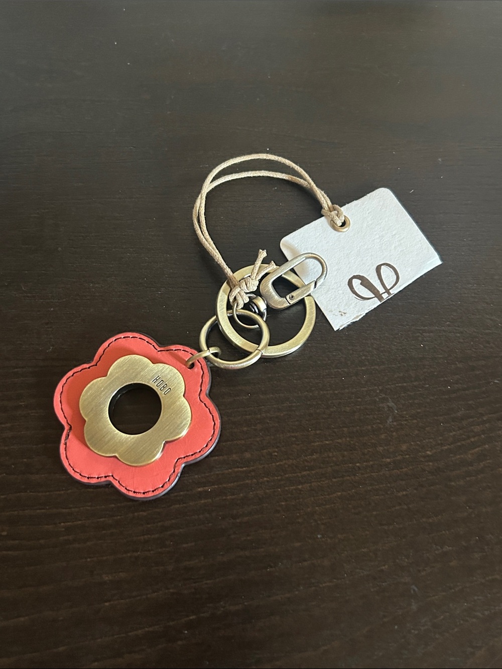 HOBO- Orange Flower Leather Key Fob with Brass-Tone Accent